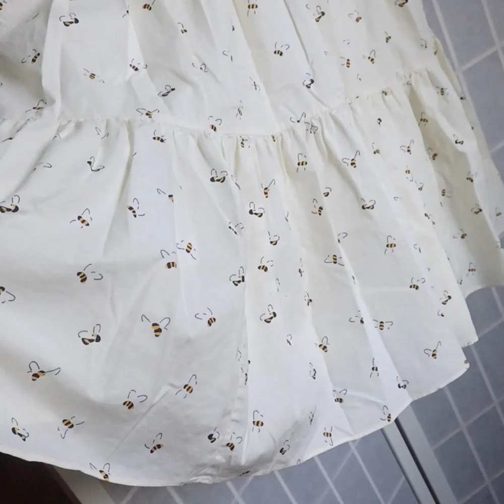kate spade Cream Sleeveless Midi Dress with Bee Print